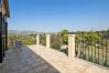 Terrace with spectacular views to the garden and the mountain