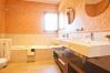 Bathroom with bathtub and two sinks