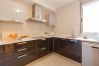 Bright kitchen with ceramic hob, dishwasher, ...