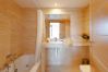 Full bathroom with ensuite bath in the master bedroom